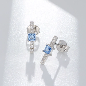 Elegant S925 sterling silver stud earrings with light blue square zircon and side stones