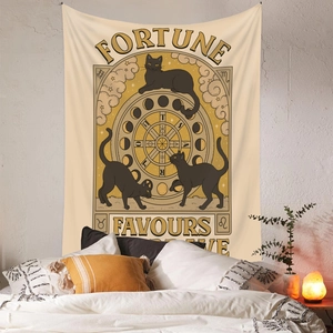 Detail of tarot style tapestry with black cats and Fortune Favours The Brave quote