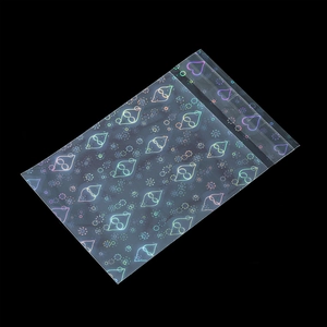 Macro shot of iridescent laser heart patterns on transparent self-sealing plastic jewelry bags