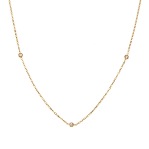 Gold plated stainless steel necklace featuring three bezel-set cubic zirconia stones