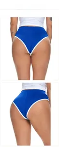 Detail von königsblauen Sport-Shorts mit hoher Taille, weißem Saum und elastischem Strick
