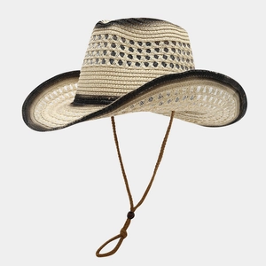 Detail of western straw cowboy hat with hollow weave pattern and adjustable chin strap