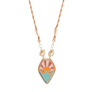 Detail of gold enamel tarot necklace featuring sunrise waves and a toggle clasp