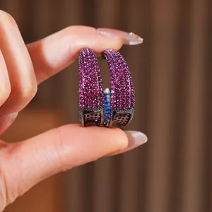 Vintage C-shaped hoop earrings with purple pink and blue zircons in black gold finish