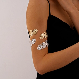Metallic leaf upper arm cuff bracelet featuring realistic vein texture in gold and silver