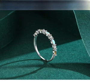 Close-up of S925 silver ring featuring marquise opal stones and round zircons