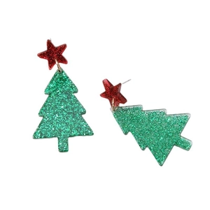 Detailed macro view of green glitter Christmas tree earrings with a red star topper