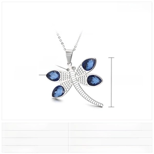 Detailed view of dragonfly pendant necklace with blue crystal glass and crystal accents