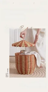 Detail of a circus tent-style woven storage basket with a red and beige wavy lid