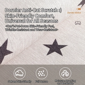 Dornier fabric chair cushion with black star pattern and non-slip silicone base