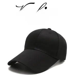Close-up of black cotton baseball cap showing twill texture and Sport metal tag