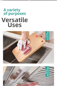 Kitchen sponge cleaning a wooden cutting board and range hood filter for deep grease removal