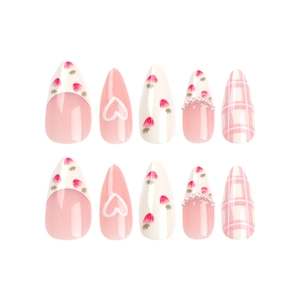 Pink and white press-on nails set with strawberry, heart patterns and pearl accents