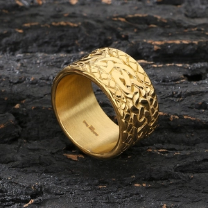 Chunky gold stainless steel men's ring featuring an intricate woven texture design