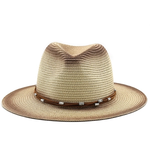 White Panama straw hat with brown gradient brim and ethnic bead decoration for sun protection