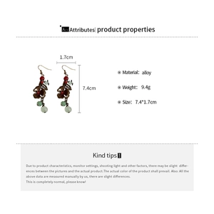Boucles d'oreilles ethniques à fleurs et pompons avec mesure de taille de 7,4 cm