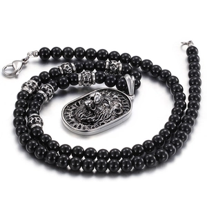 Punk men's necklace featuring silver lion head pendant and black hematite bead chain