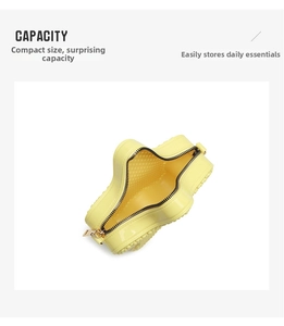 Internal view of star-shaped yellow PVC crossbody bag showing capacity and zipper detail