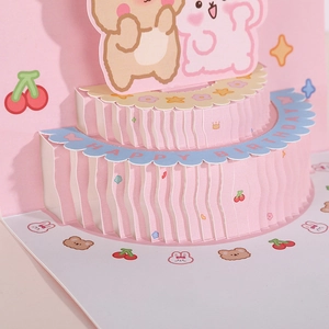 3D pop-up birthday card featuring cute pink cartoon bears, rabbits, and a double-layer cake