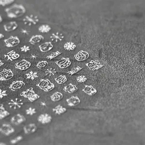 5D embossed lucky cat nail stickers with textured snowflake and fortune patterns
