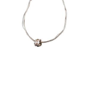 Silver layered necklace with cubic zirconia cylindrical pendant in a minimalist design