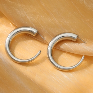 Minimalist silver-tone C-shape hoop earrings in polished thick stainless steel