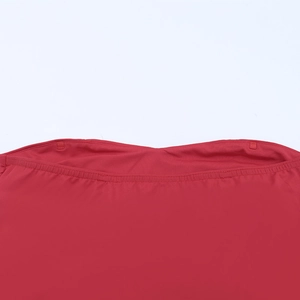 Close-up of red bodycon dress waistline with high-quality double-needle stitching detail