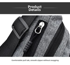 Detail view of smooth black nylon zippers and durable texture on gray fabric waist bag