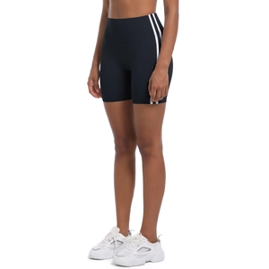 Detail of high-waist black yoga shorts featuring two vertical white stripes on the leg