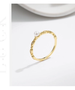 Detailed macro view of S925 silver ring with pearl and marquise crystal settings
