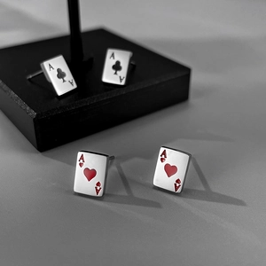 Detail of playing card Ace studs in stainless steel with spade and heart heart designs