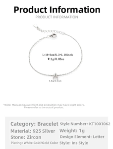 Detail of 925 sterling silver A-letter charm bracelet with cubic zirconia inlay and specs