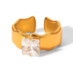 Macro detail of 18k gold plated stainless steel ring with square cubic zirconia stone