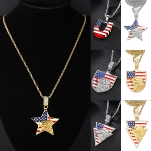 Detailed view of hip hop eagle pendants with American flag enamel and iced out crystals