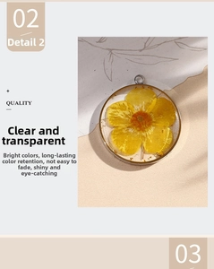 Detail of round resin pendant with yellow dried flower and gold foil in silver frame