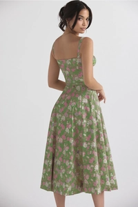 Detail of floral spaghetti strap midi dress showing back design and waist silhouette
