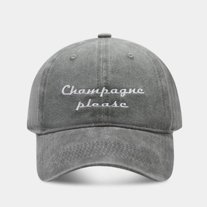 Detail of Champagne Please embroidery on vintage washed grey cotton baseball cap
