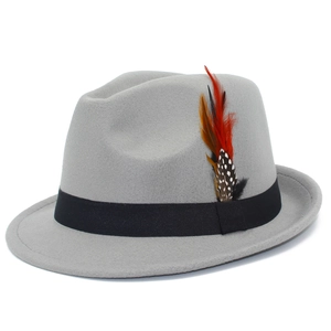 Detail of grey wool felt fedora with black satin band and colorful feather accent