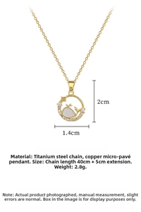 Detail of whale and moon pendant showing 40+5cm chain length and 2.8g lightweight design