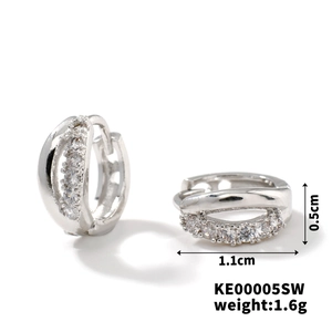 Detail view of silver cubic zirconia hoop earrings showing 1.1cm width and 0.5cm thickness