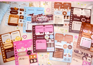 Detailed view of the 12-sheet monthly calendar sticker set for scrapbooking