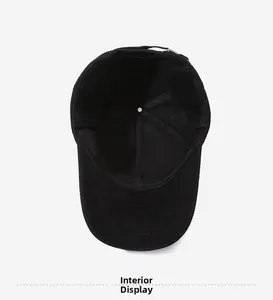 Interior view of black winter baseball cap with cotton lining and adjustable buckle
