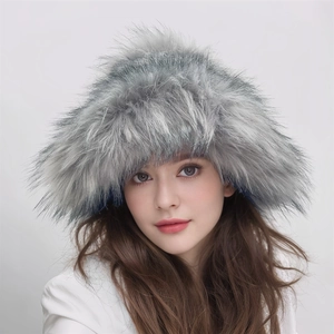 Close-up of thick silver faux fur winter hat showcasing high-volume texture and warmth