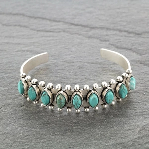 Bohemian open cuff bracelet with 11 marquise-cut natural turquoise stones in vintage silver