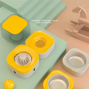 Modulaire voerbak en waterdispenser voor huisdieren met grijze bakken op een gele basis