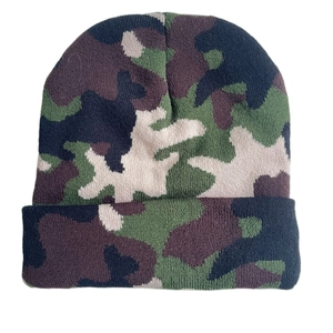 Detail view of the camouflage knit beanie showing classic green and brown stitch texture