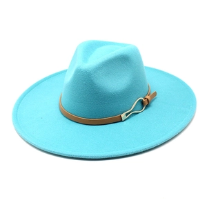 Detail of teal wool fedora hat featuring brown leather band and gold metal buckle