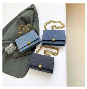 Detailed comparison of light, medium, and dark blue quilted denim crossbody bags