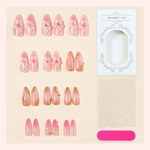 3D floral press-on nails set with pink gradient, gold lines and tools in a gift box