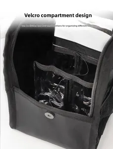Internal view of makeup bag with adjustable velcro dividers forming four compartments